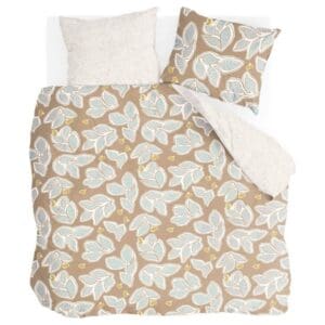 Dekbedovertrek met bladerenpatroon in beige en blauw.