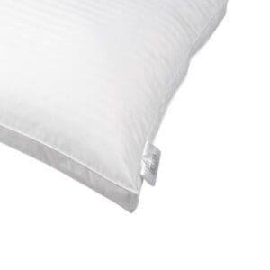 Wit kussen met label opzij