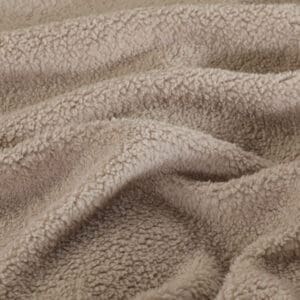 Bruine fleecestof close-up voor texturenontwerp